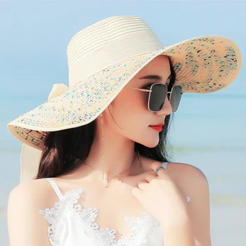 夏の女性の大きなつばわら弓帽子サンファッションの広いつばのフロッピーナキャップを屋外での折りたたみ式紫外線保護のた旅行の人気のビーチ帽子