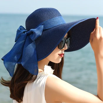 夏の女性の大きなつばわら弓帽子サンファッションの広いつばのフロッピーナキャップを屋外での折りたたみ式紫外線保護のた旅行の人気のビーチ帽子